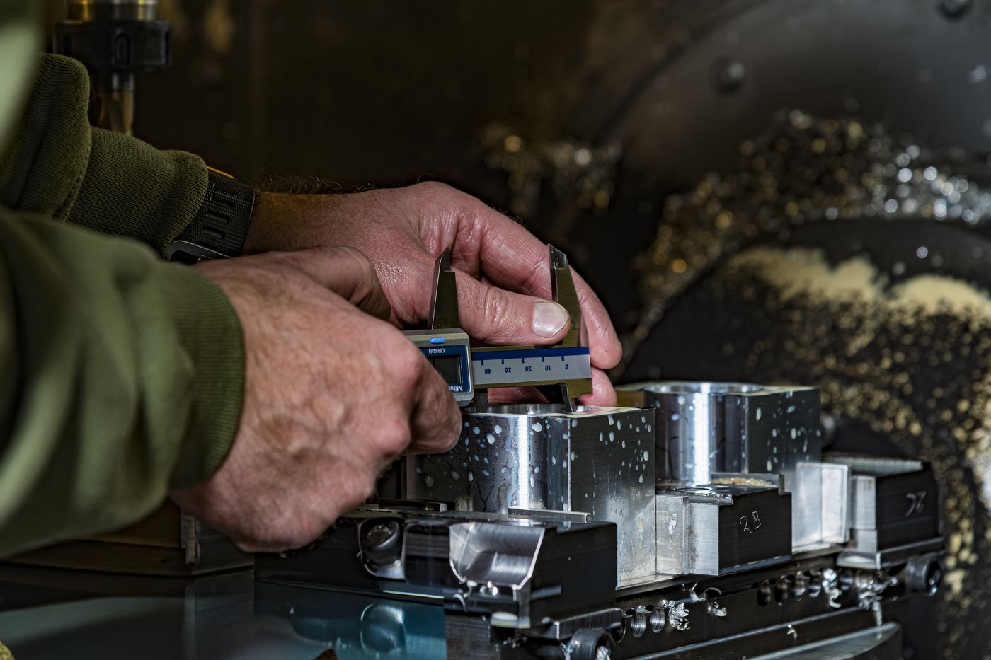 In-process inspection at JSR Engineering in Denmark: measuring CNC-machined Rennen ITB billet components with digital calipers at the machine
